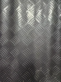 Alternative view of Piso Vinilico Simil Chapa Semilla Melon Transito Ancho 1,40 Gris